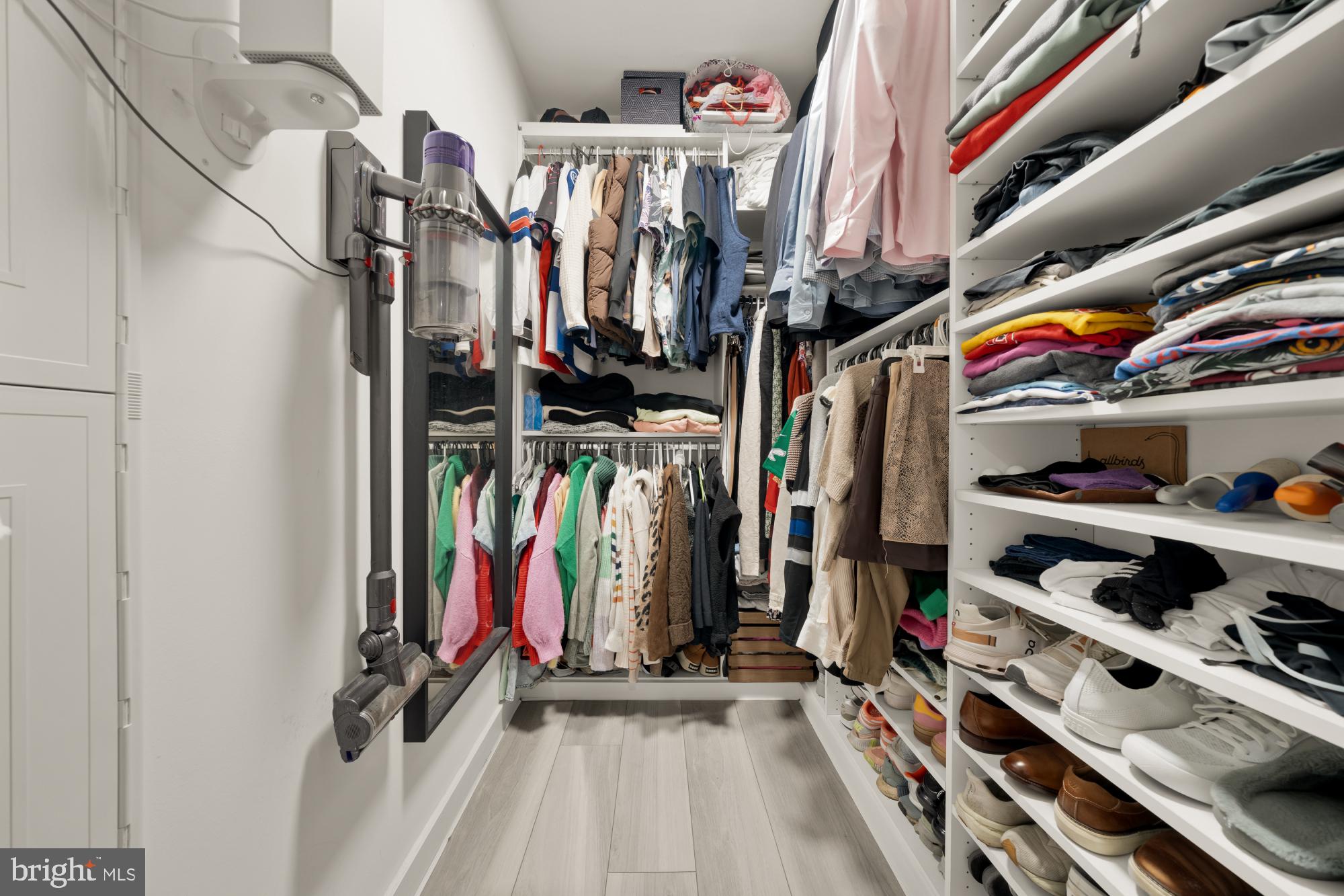 4816 3rd Street Northwest, Unit 2 Washington, DC 20011 - Photo 34 of 35 a view of walk in closet with clothes and shoes