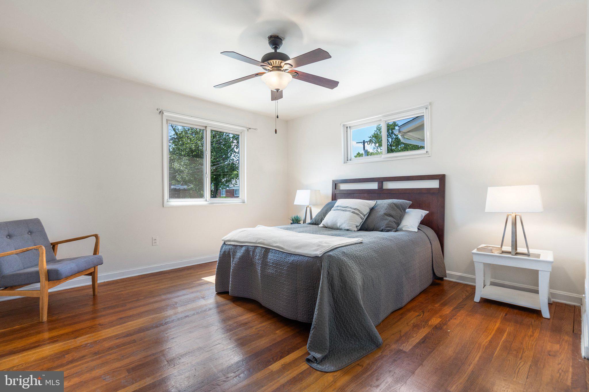 4618 Hilltop Terrace Southeast Washington, DC 20019 - Photo 14 of 36 a bedroom with a bed and a window