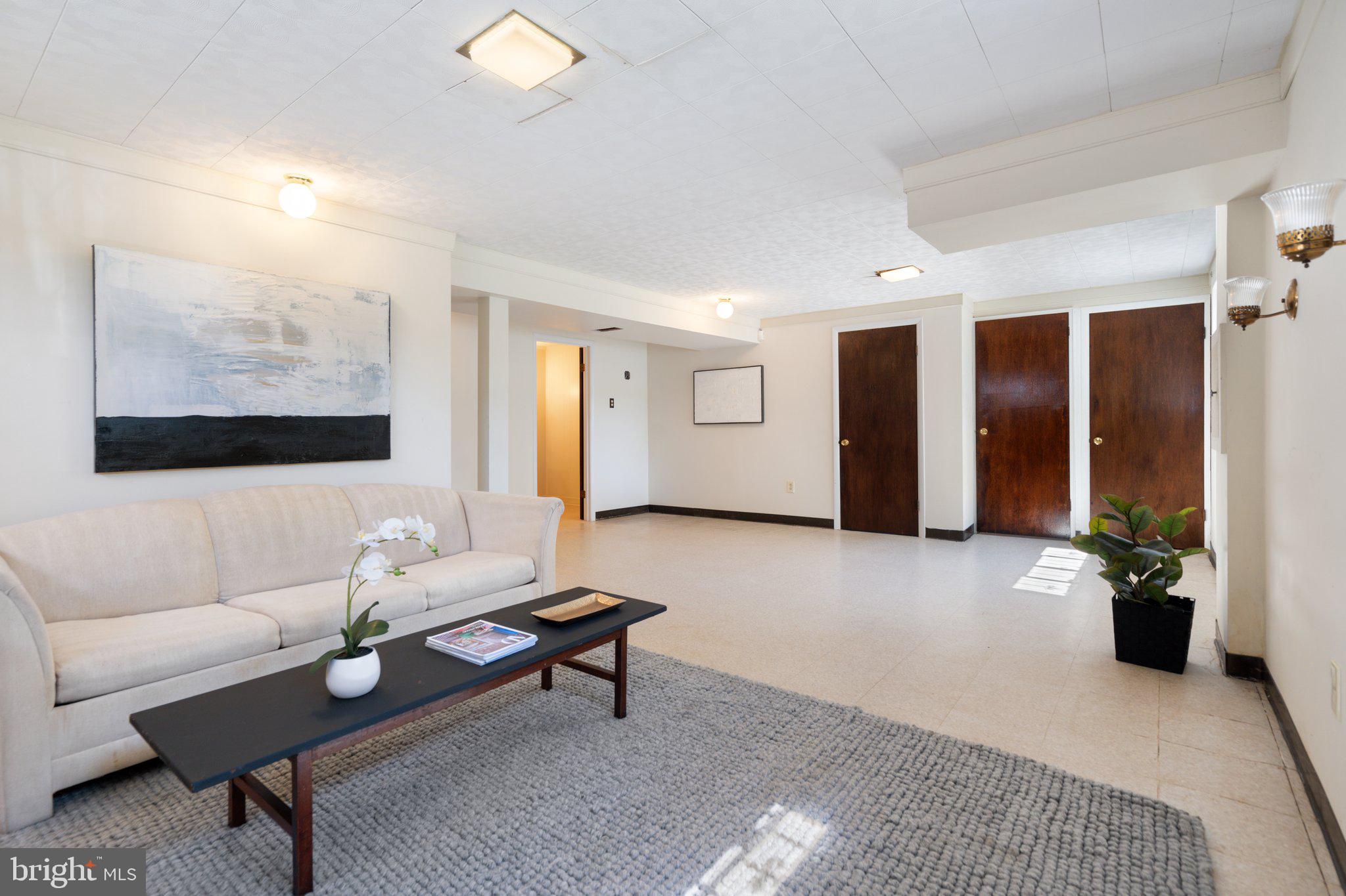 4618 Hilltop Terrace Southeast Washington, DC 20019 - Photo 24 of 36 a living room with furniture and wooden floor