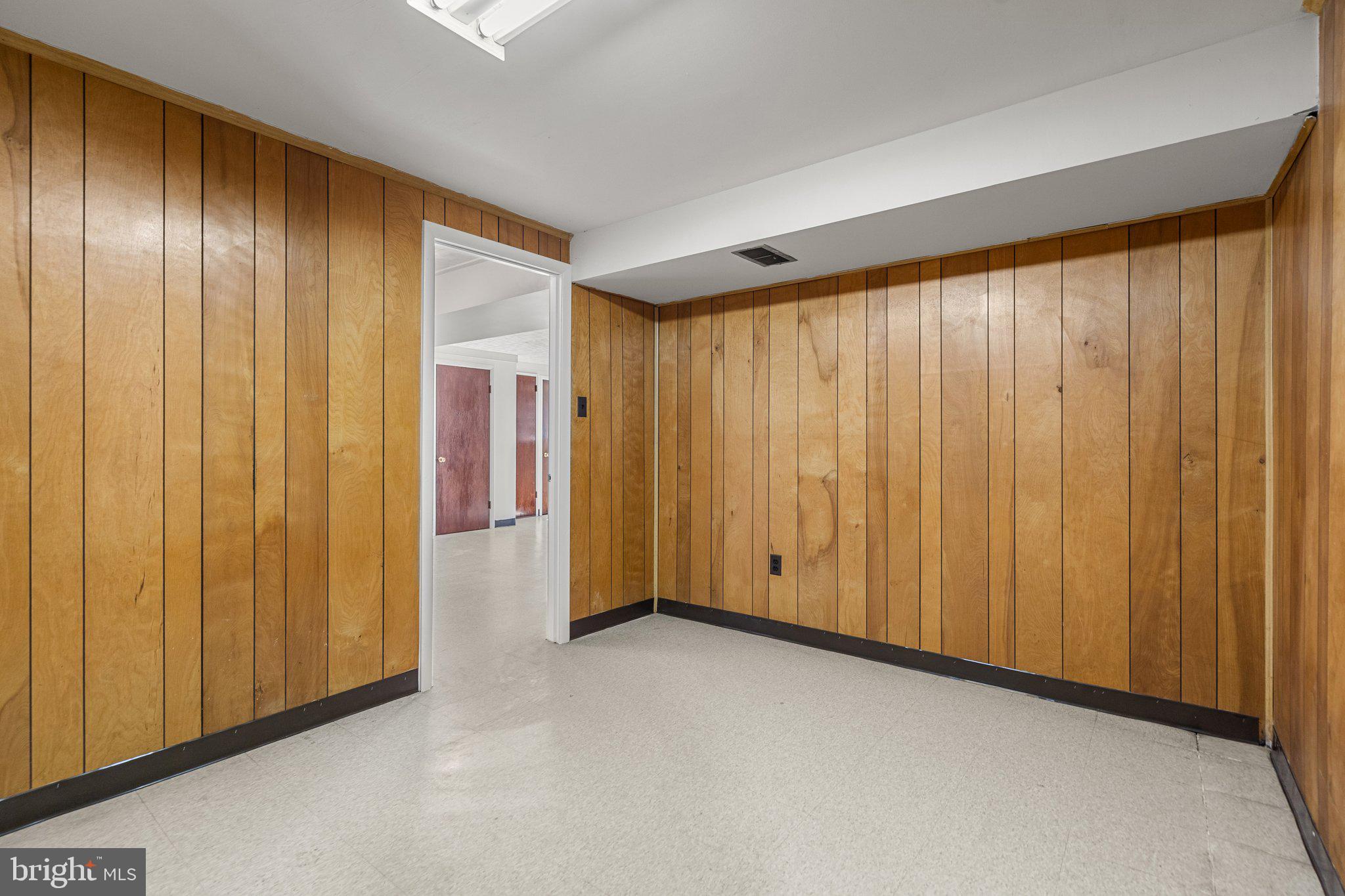 4618 Hilltop Terrace Southeast Washington, DC 20019 - Photo 27 of 36 a view of an empty room with a window