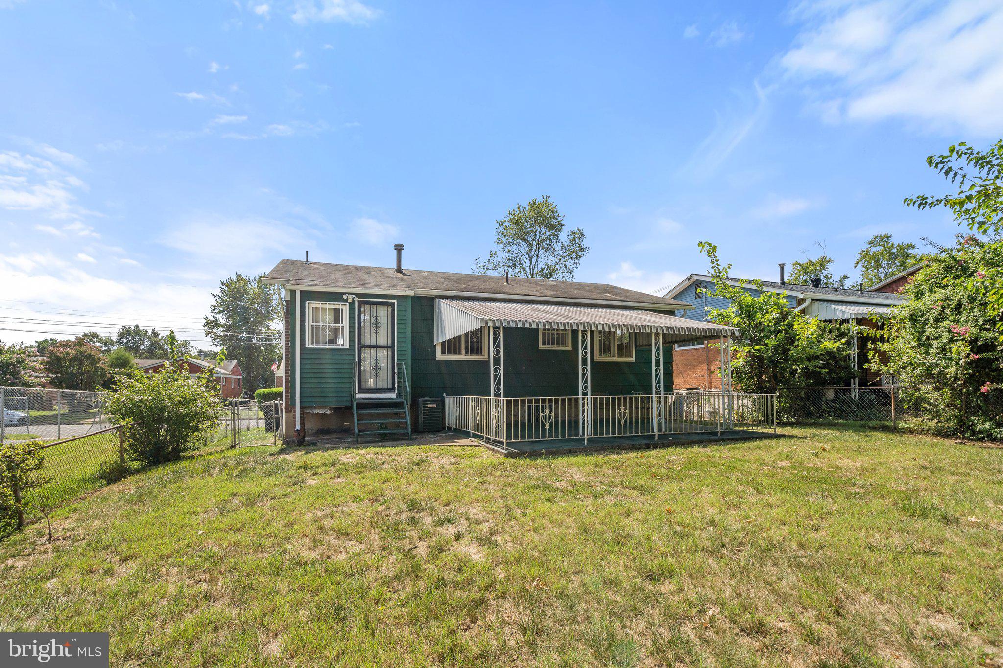 4618 Hilltop Terrace Southeast Washington, DC 20019 - Photo 32 of 36 a view of a house with a yard