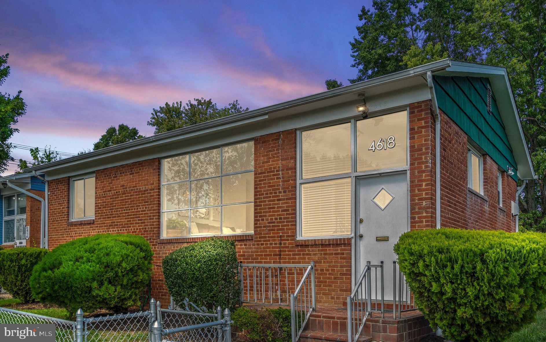 4618 Hilltop Terrace Southeast Washington, DC 20019 - Photo 34 of 36 a front view of a house with garden