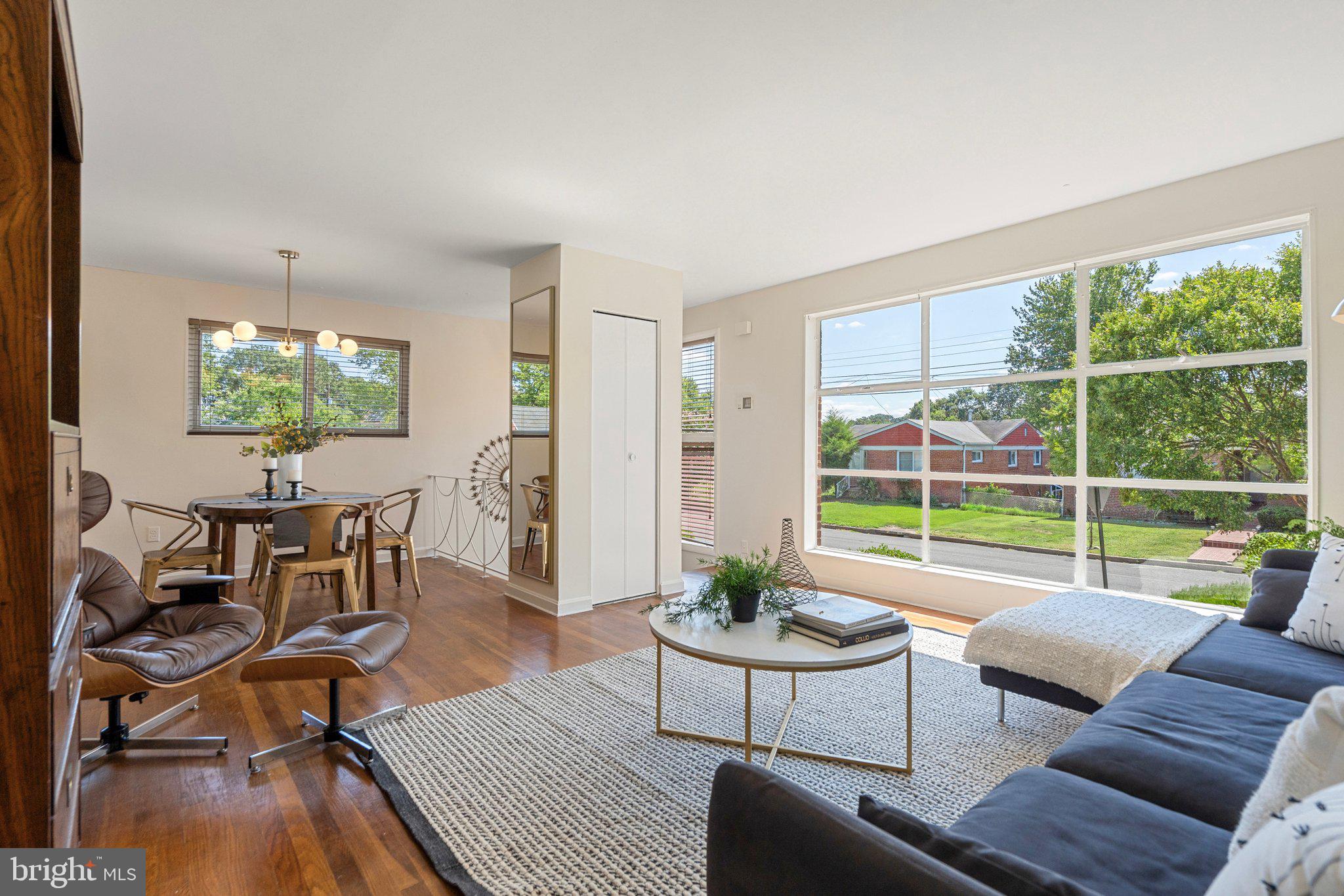 4618 Hilltop Terrace Southeast Washington, DC 20019 - Photo 5 of 36 a living room with furniture and a large window