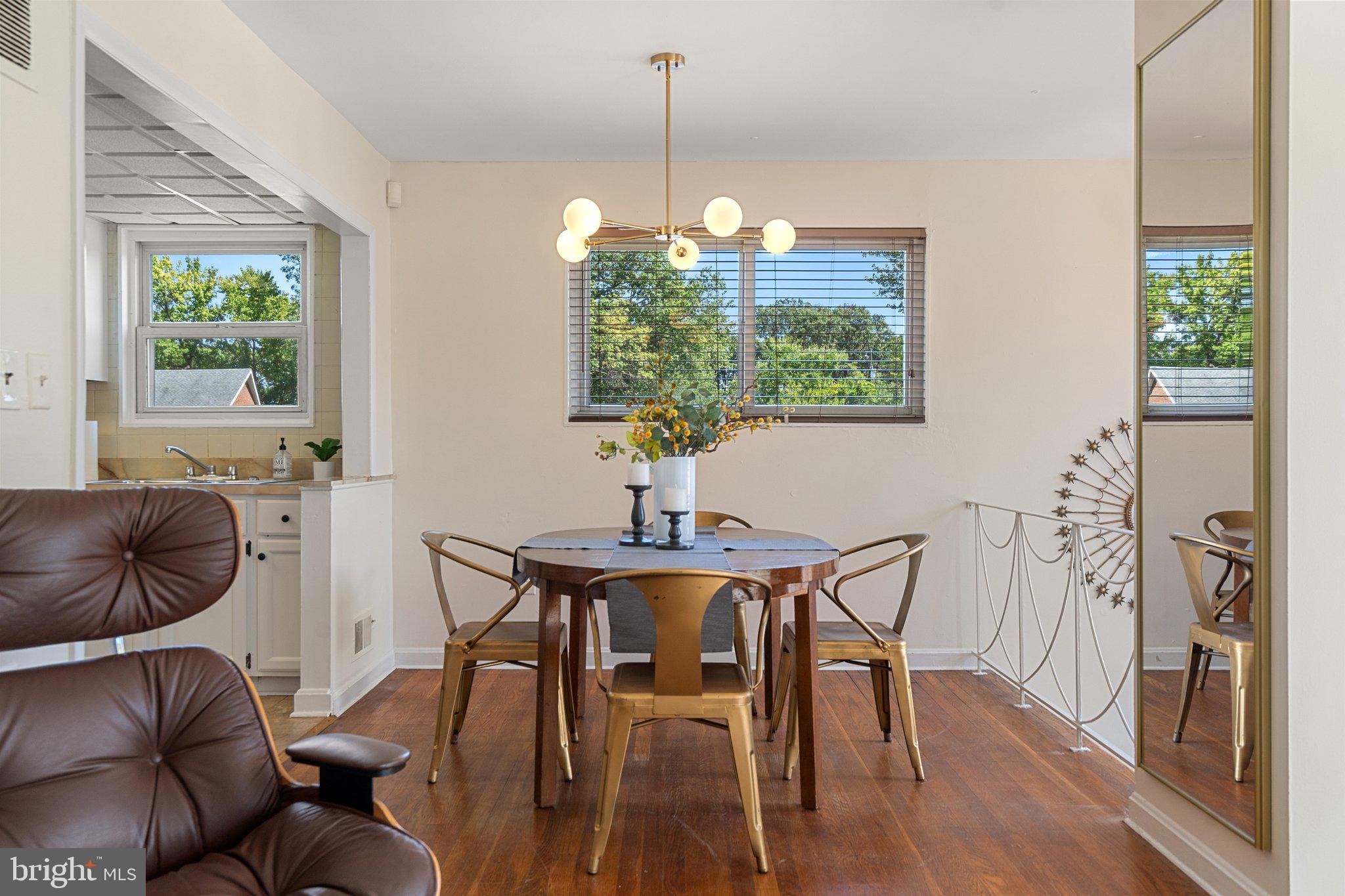 4618 Hilltop Terrace Southeast Washington, DC 20019 - Photo 7 of 36 a view of a livingroom with furniture window and wooden floor