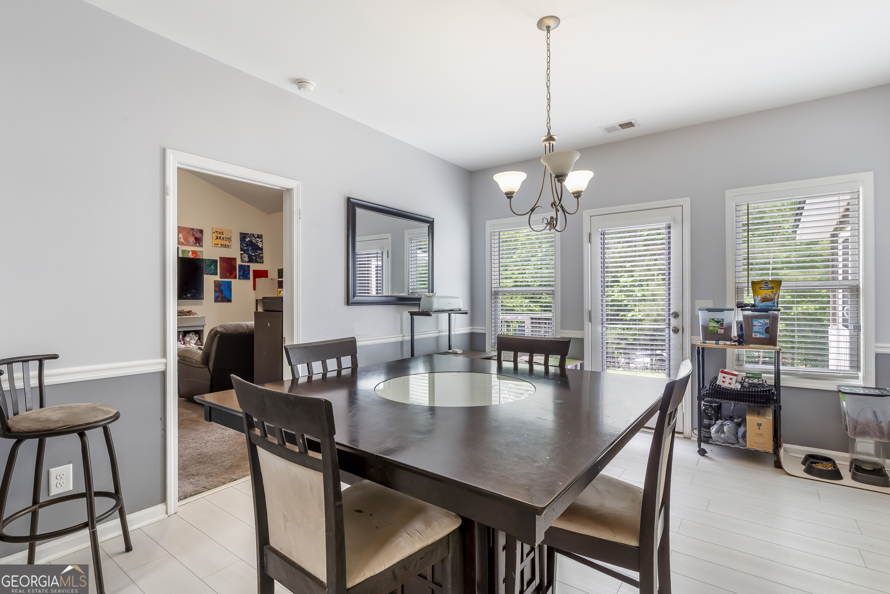 370 Springwater Way Bremen, GA 30110 - Photo 15 of 32 a dining room with furniture window and wooden floor