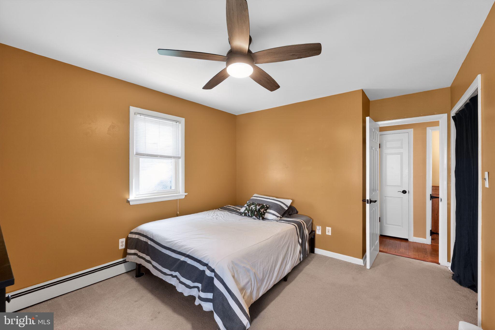 10386 Gorman Road Laurel, MD 20723 - Photo 23 of 30 Cozy bedroom with warm tones.