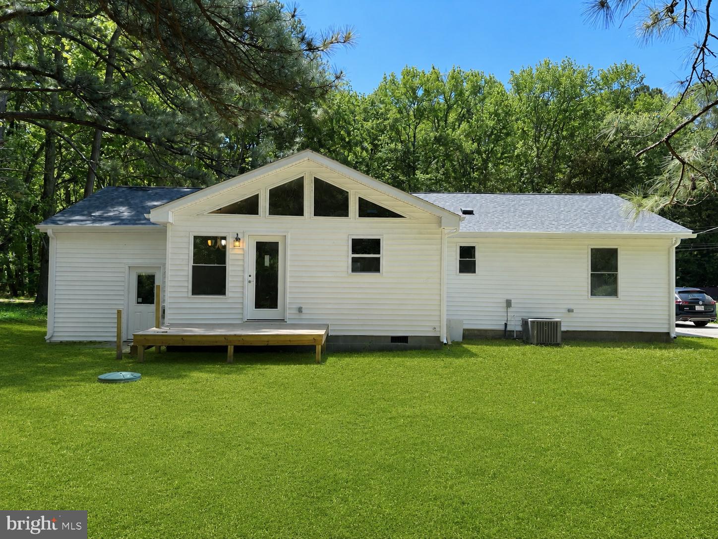 12199 Tower Way Exmore, VA 23350 - Photo 4 of 6 Charming home nestled in lush greenery.