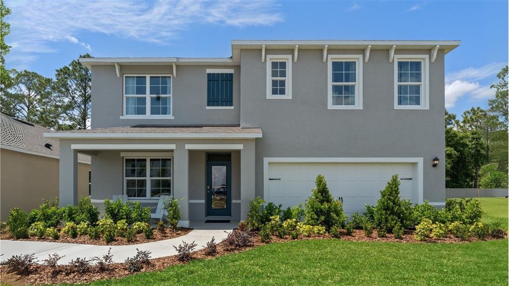 5289 Masser Road St. Cloud, FL 34772 - Photo 1 of 24 front view of a house with a yard