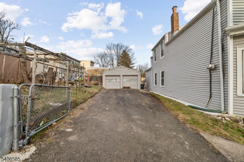 150 Jefferson Street Paterson, NJ 07522 - Photo 2 of 31 a view of a house with backyard and garage