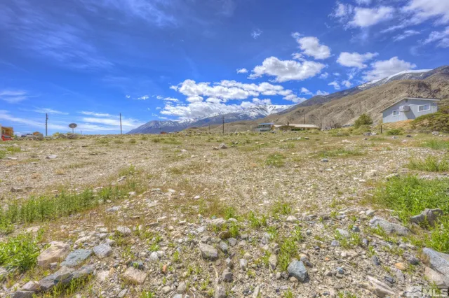 a view of mountain with sunset