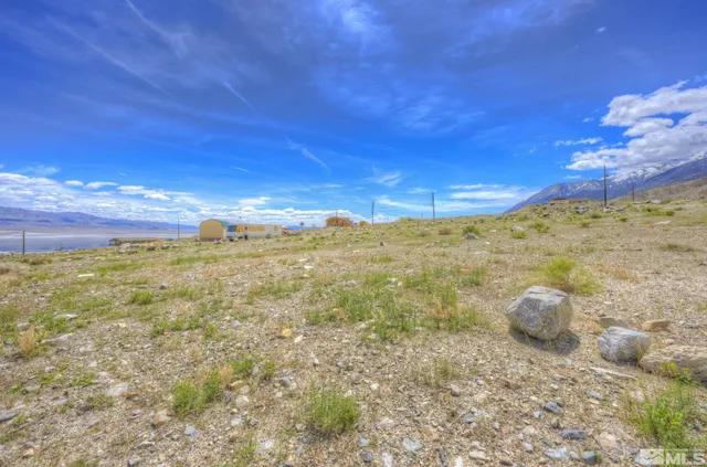 a view of a pathway of a building with a yard