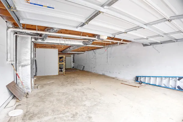 a view of a room with wooden walls
