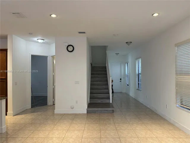 a view of a hallway with entryway