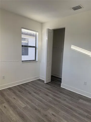 a bathroom with a bathtub a toilet and a shower