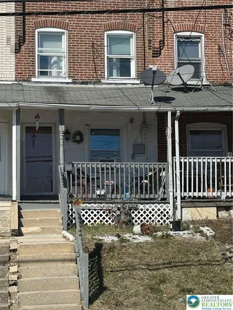 front view of a house with a porch