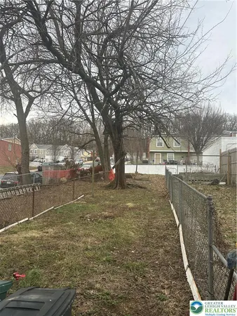 a view of yard with trees