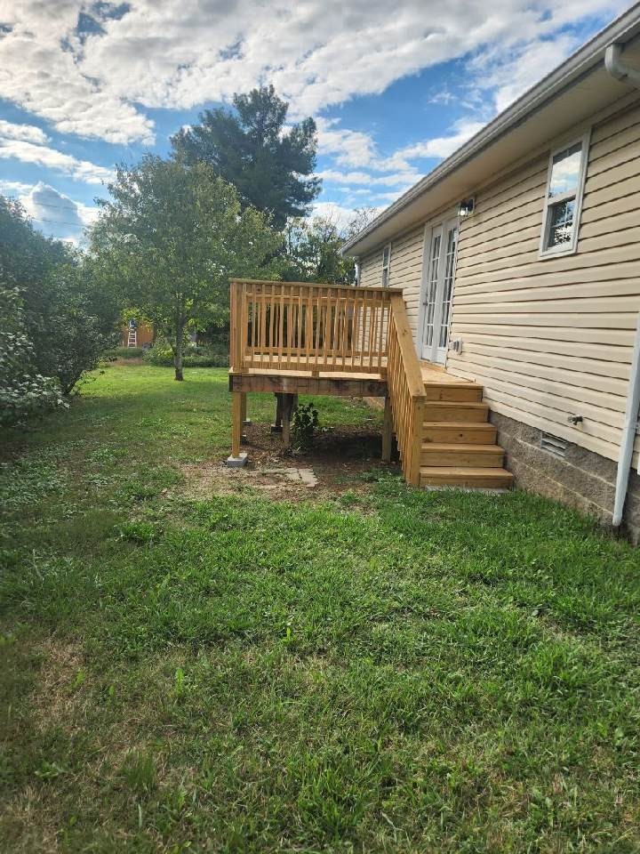318 Reeves Court Springfield, TN 37172 - Photo 2 of 9 a view of a bench in the garden