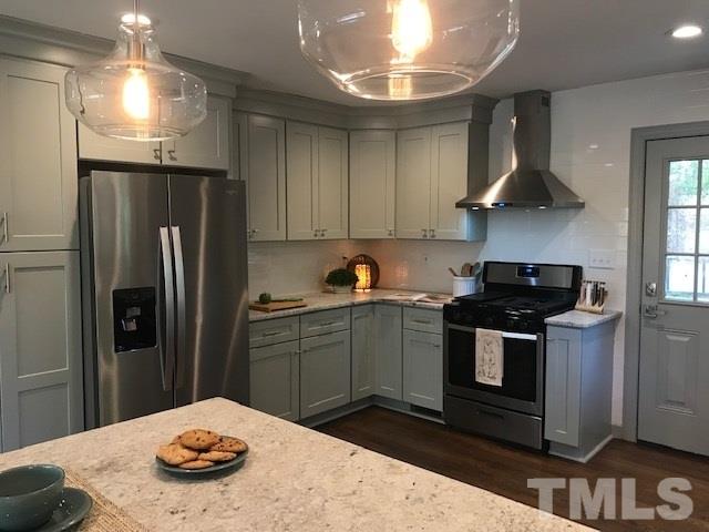 713 Chatham Lane Raleigh, NC 27610 - Photo 2 of 20 Gas Range and Designer Hood