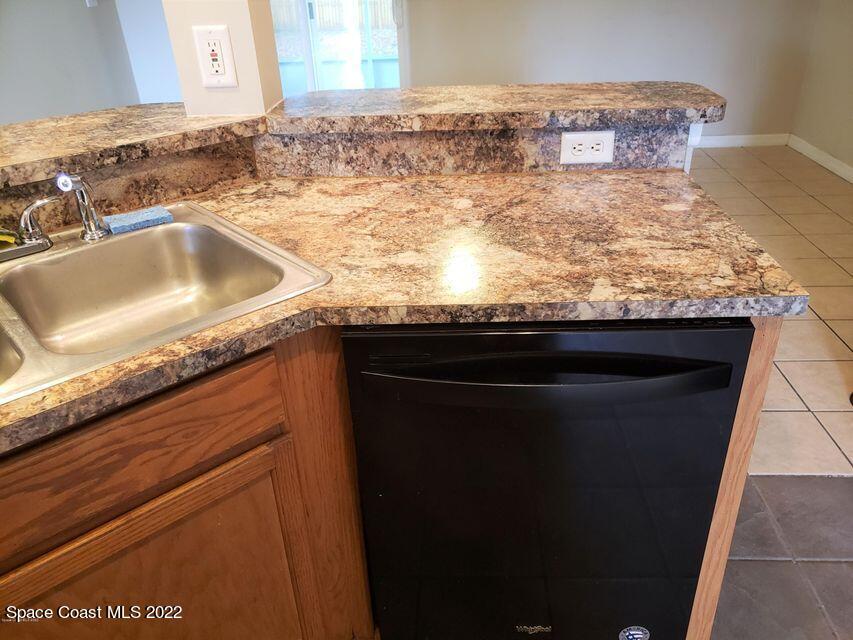 5649 Beaverbrook Street Cocoa, FL 32927 - Photo 11 of 29 a close view of sink and tap