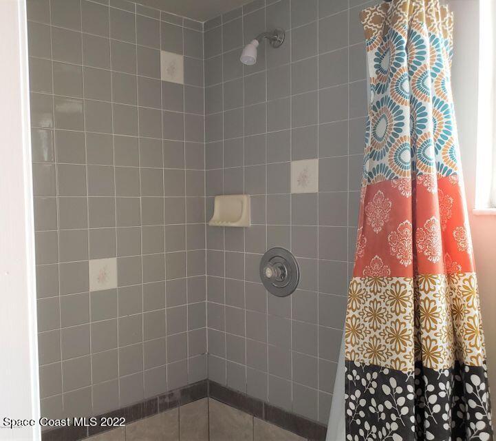 5649 Beaverbrook Street Cocoa, FL 32927 - Photo 19 of 29 a bathroom with a shower