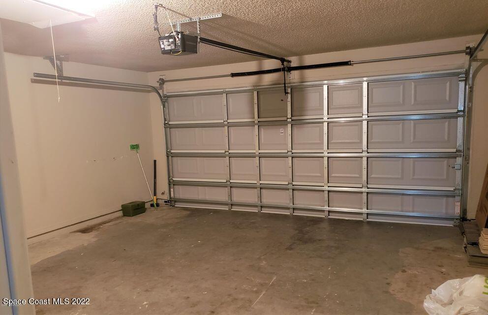 5649 Beaverbrook Street Cocoa, FL 32927 - Photo 20 of 29 a view of a room with rack on the wall