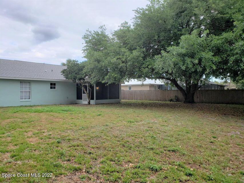 5649 Beaverbrook Street Cocoa, FL 32927 - Photo 22 of 29 a house view with a outdoor space
