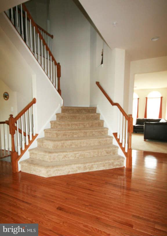 2715 Lucas Run Way Accokeek, MD 20607 - Photo 3 of 26 Sweeping Staircase