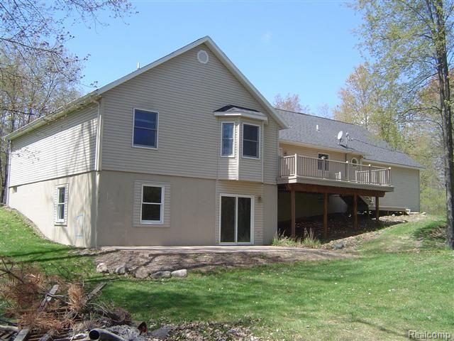 9874 Bergin Road Howell, MI 48843 - Photo 2 of 13 Rear Walkout and Deck