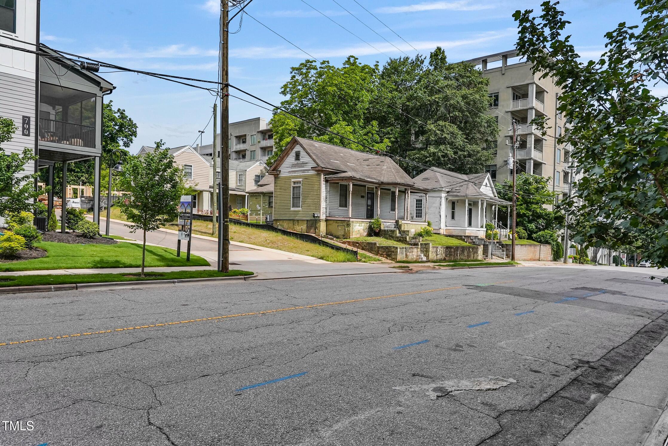 407 North Boylan Avenue Raleigh, NC 27603 - Photo 8 of 15 a view of multiple houses with a street
