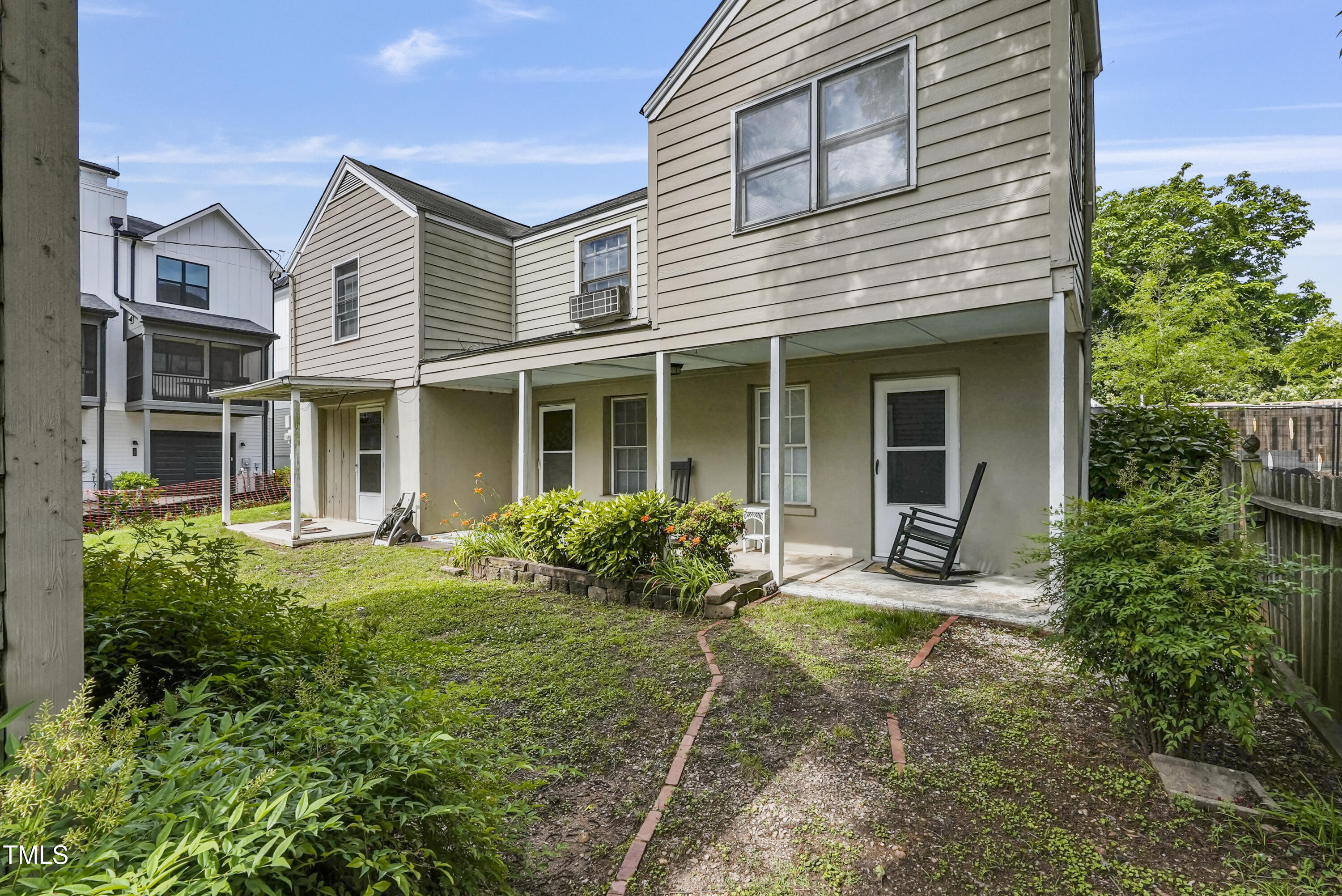 407 North Boylan Avenue Raleigh, NC 27603 - Photo 10 of 15 a view of a house with sitting area and garden