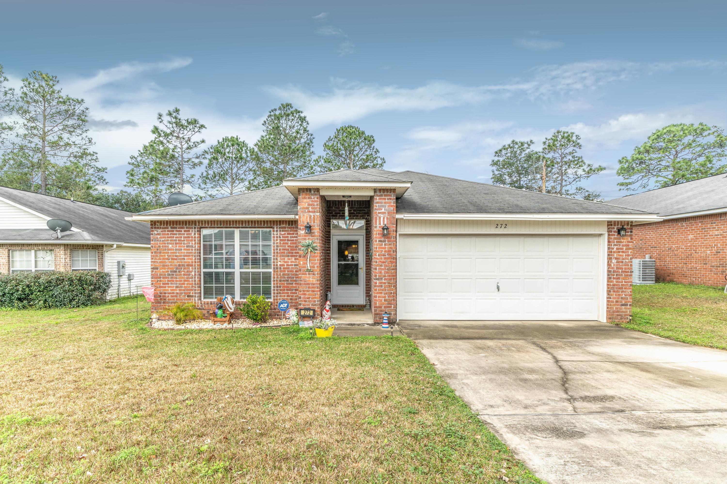 272 Limestone Circle Crestview, FL 32539 - Photo 1 of 30 front view of a house with a yard