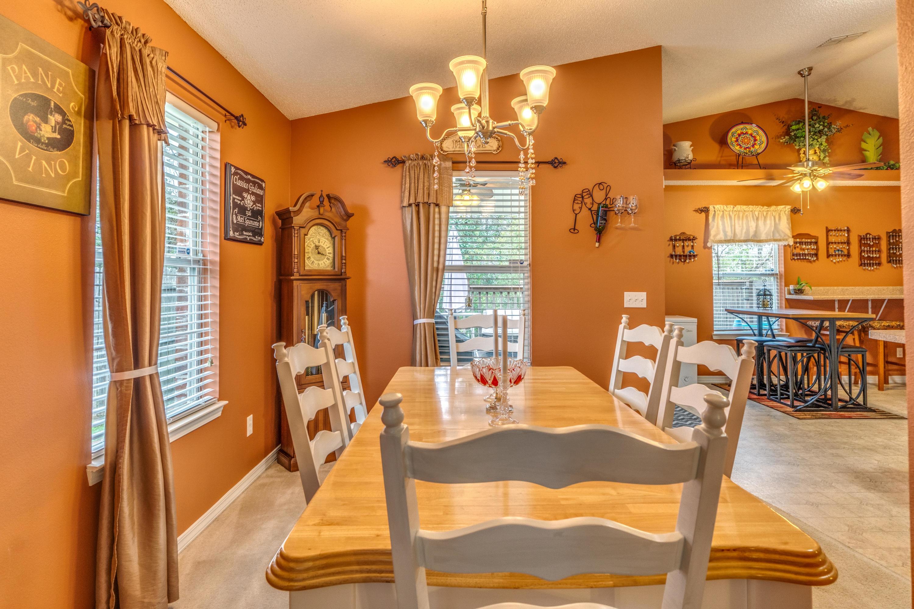 272 Limestone Circle Crestview, FL 32539 - Photo 14 of 30 a view of a dining room with furniture and chandelier
