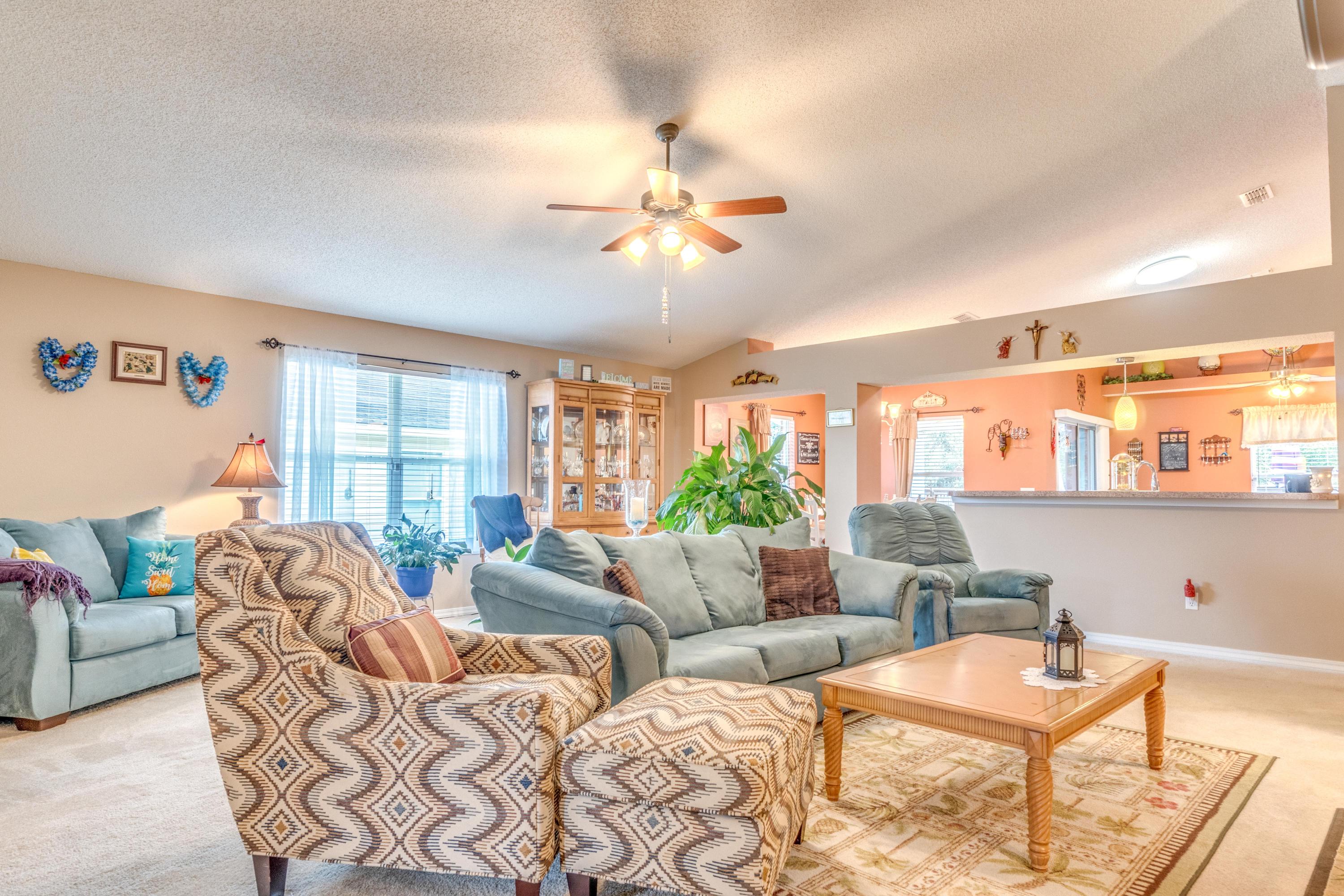 272 Limestone Circle Crestview, FL 32539 - Photo 17 of 30 a living room with furniture and a large window