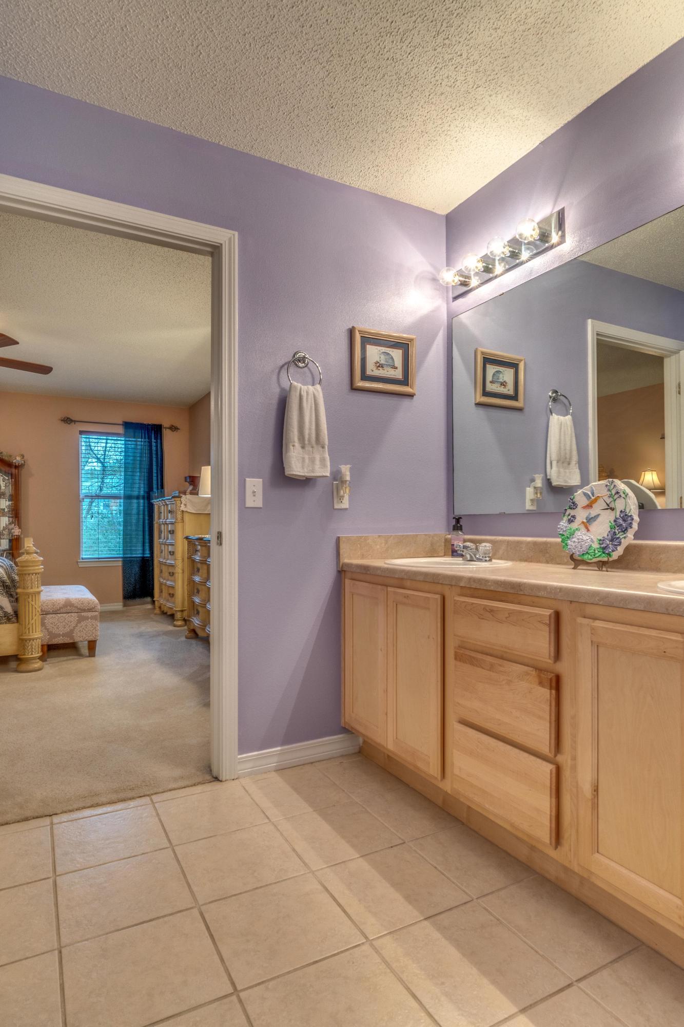 272 Limestone Circle Crestview, FL 32539 - Photo 19 of 30 a bathroom with a sink and a mirror