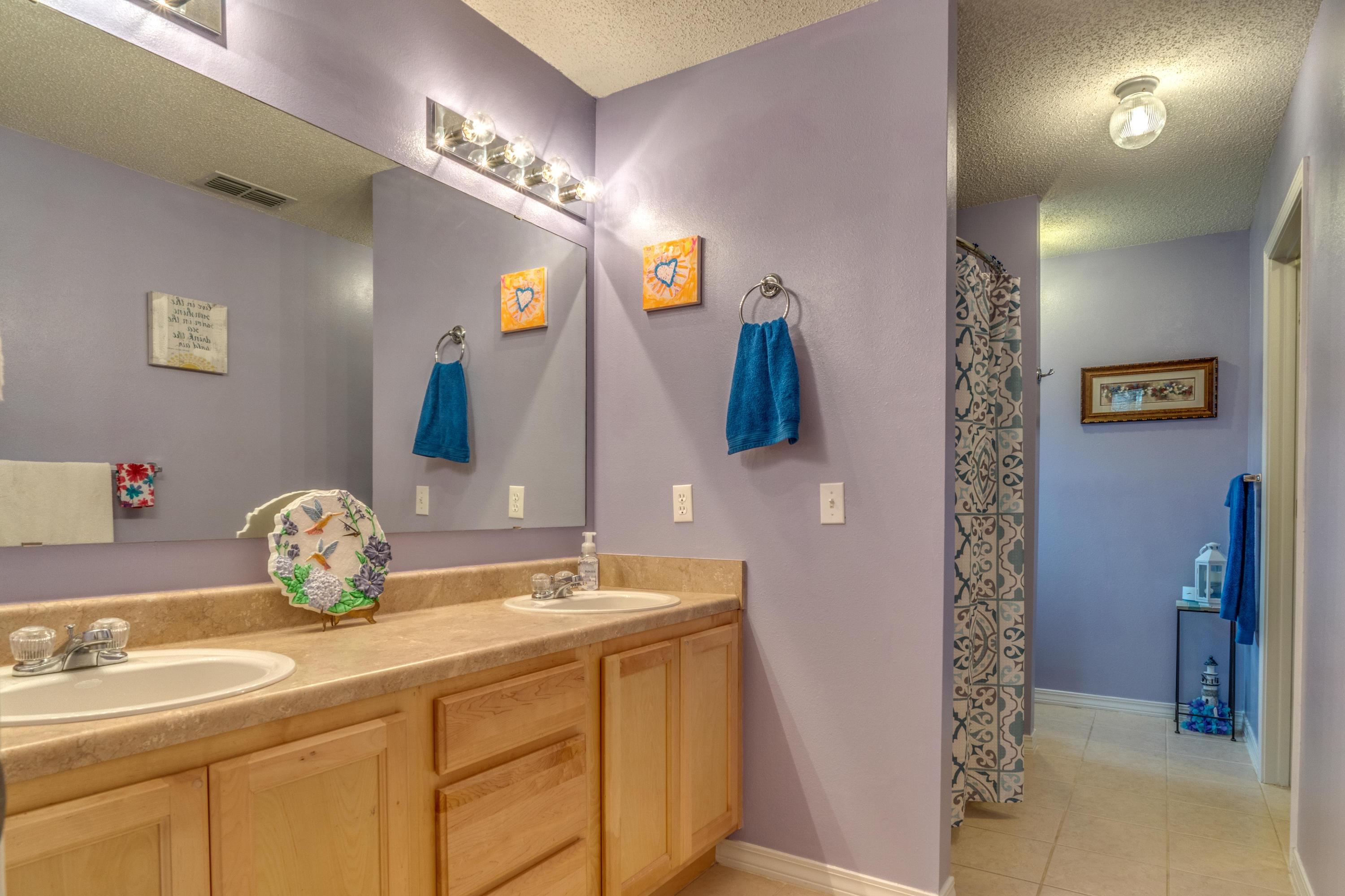 272 Limestone Circle Crestview, FL 32539 - Photo 22 of 30 a bathroom with a sink and a mirror