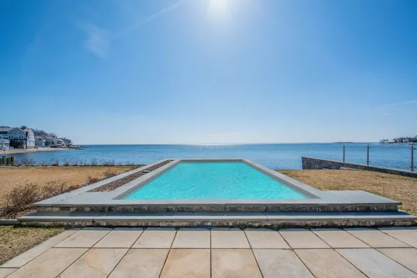 a lobby with furniture and rug