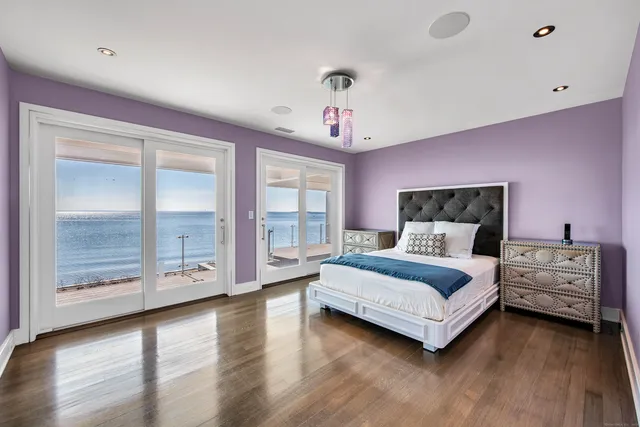 a bathroom with a sink a mirror and a shower