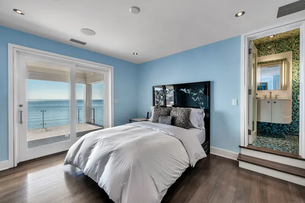 a bathroom with a tub sink and shower