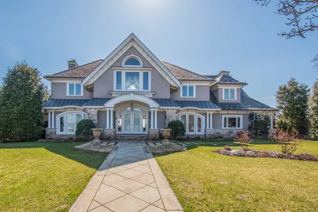 a front view of a house with swimming pool