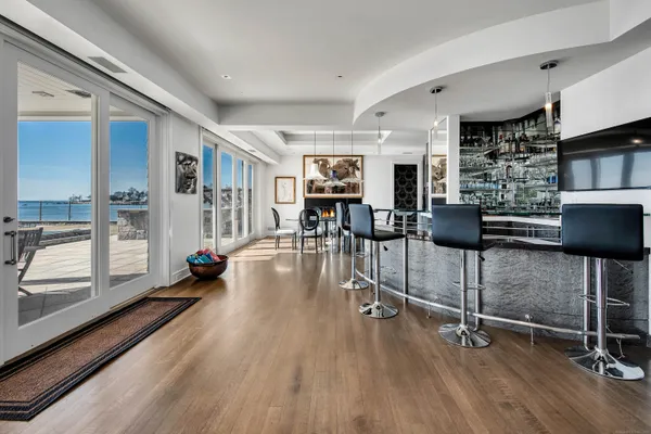 a view of a living room and dining room