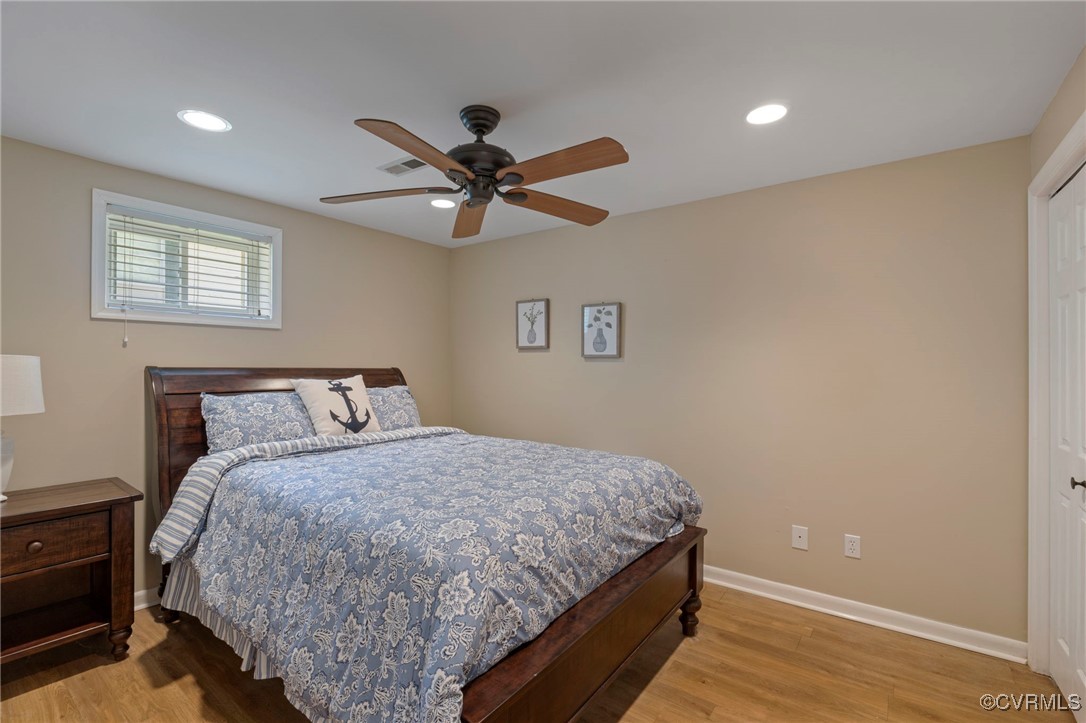 104 Manassas Point Locust Grove, VA 22508 - Photo 30 of 47 a bedroom with a bed and a ceiling fan