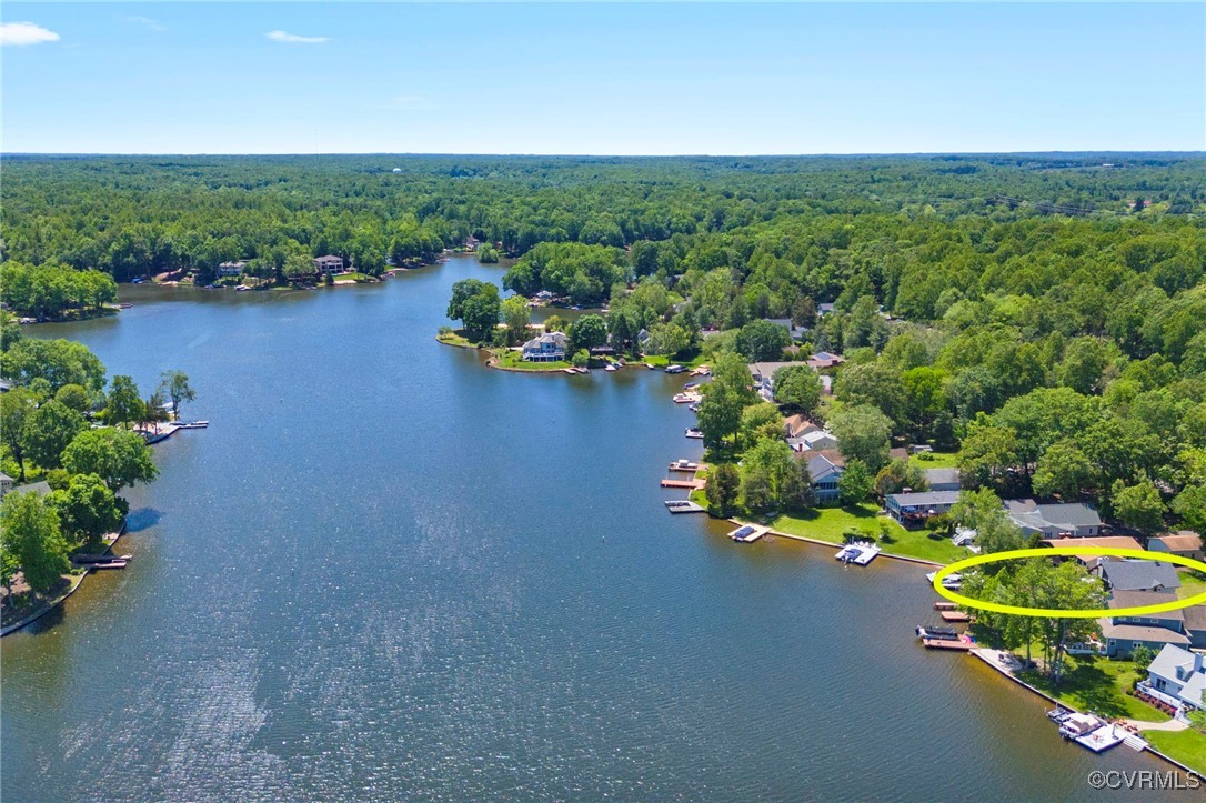 104 Manassas Point Locust Grove, VA 22508 - Photo 7 of 47 an aerial view of a house with a garden and lake view