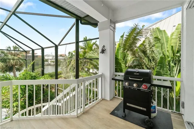 a bed room with a bed and a window