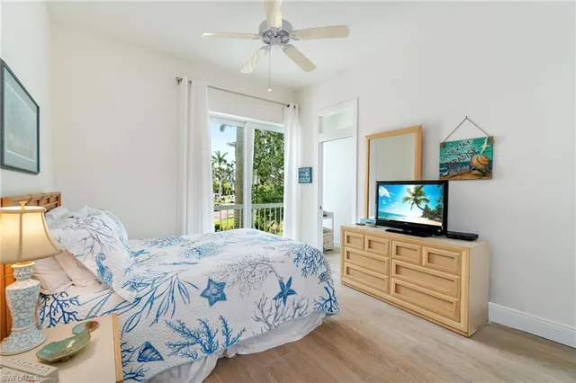 a bathroom with a double vanity sink and a window