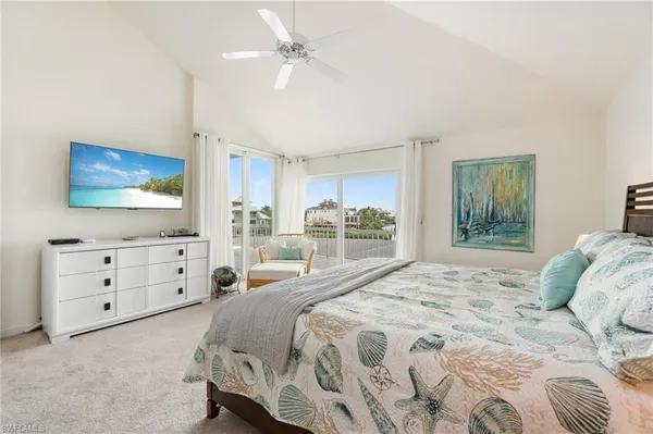 a bathroom with a sink a large mirror and shower