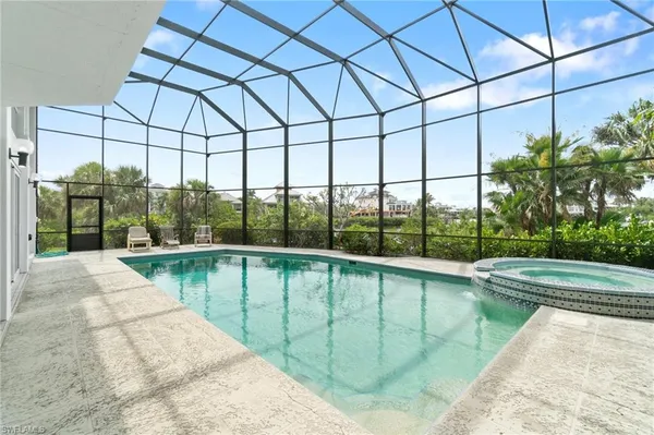 a view of a swimming pool with a patio
