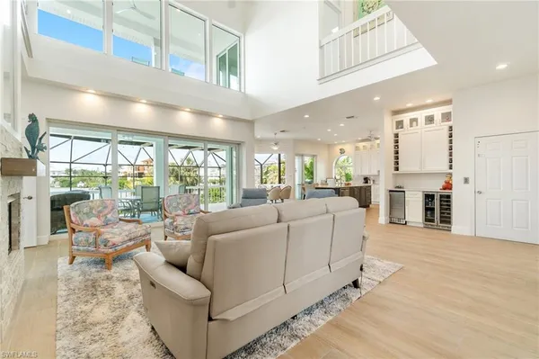 a view of kitchen with furniture and flat screen tv