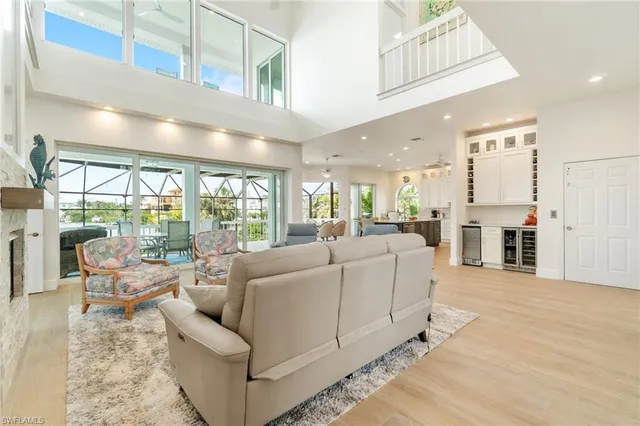 a view of kitchen with furniture and flat screen tv