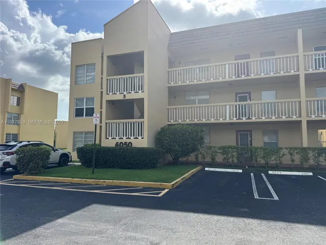a view of a patio with a yard