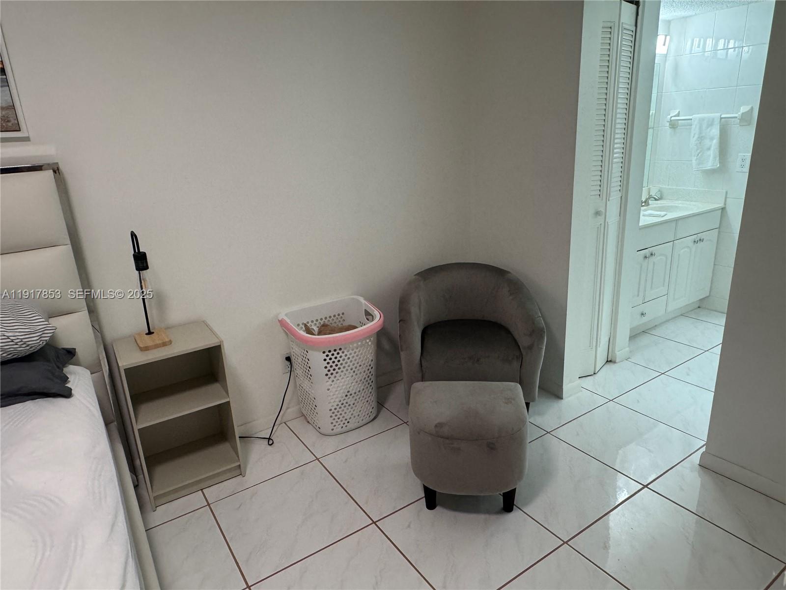 6050 Northwest 64th Avenue, Unit 306 Tamarac, FL 33319 - Photo 21 of 31 a living room with furniture